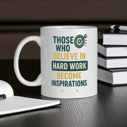 White mug with an empowering message about hard work and inspiration.